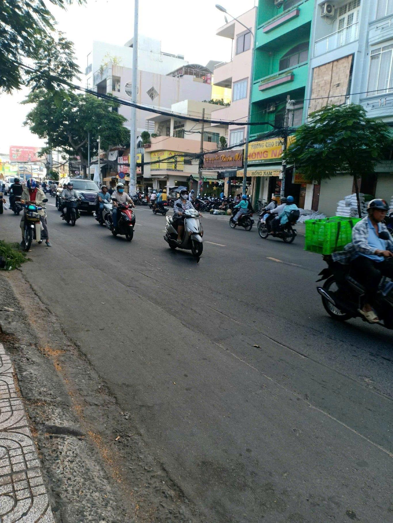 BÁN NHÀ MTKD LẠC LONG QUÂN, Q.11 5 TẦNG 7 PN, 7 WC GIÁ 22 TỶ